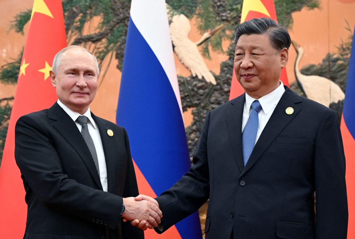 الرئيسين الصيني شي جينبينغ ونظيرها الروسي فلاديمير بوتين