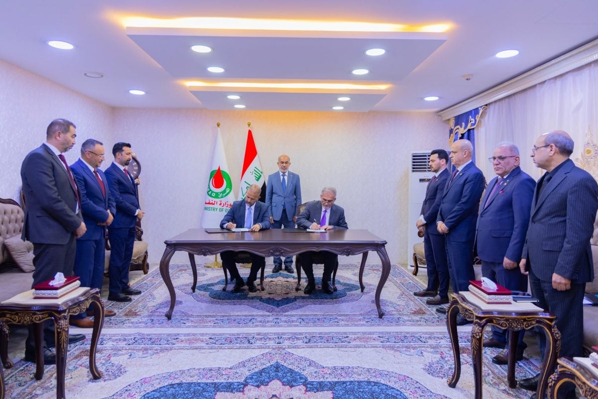 جانب من توقيع الاتفاقية بين نفط البصرة وهاليبرتون الأميركية